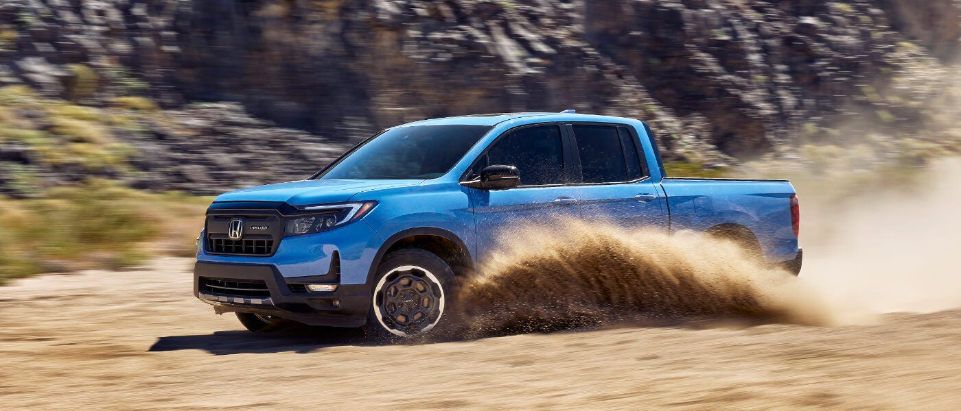 2025 Honda Ridgeline kicking up dust