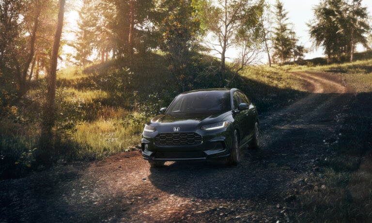 2027 Honda HR-V driving on dirt path