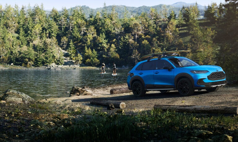 2027 Honda HR-V parked by water with paddleboard